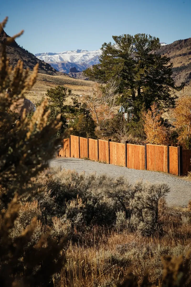 Cedar privacy fence with mountain backdrop