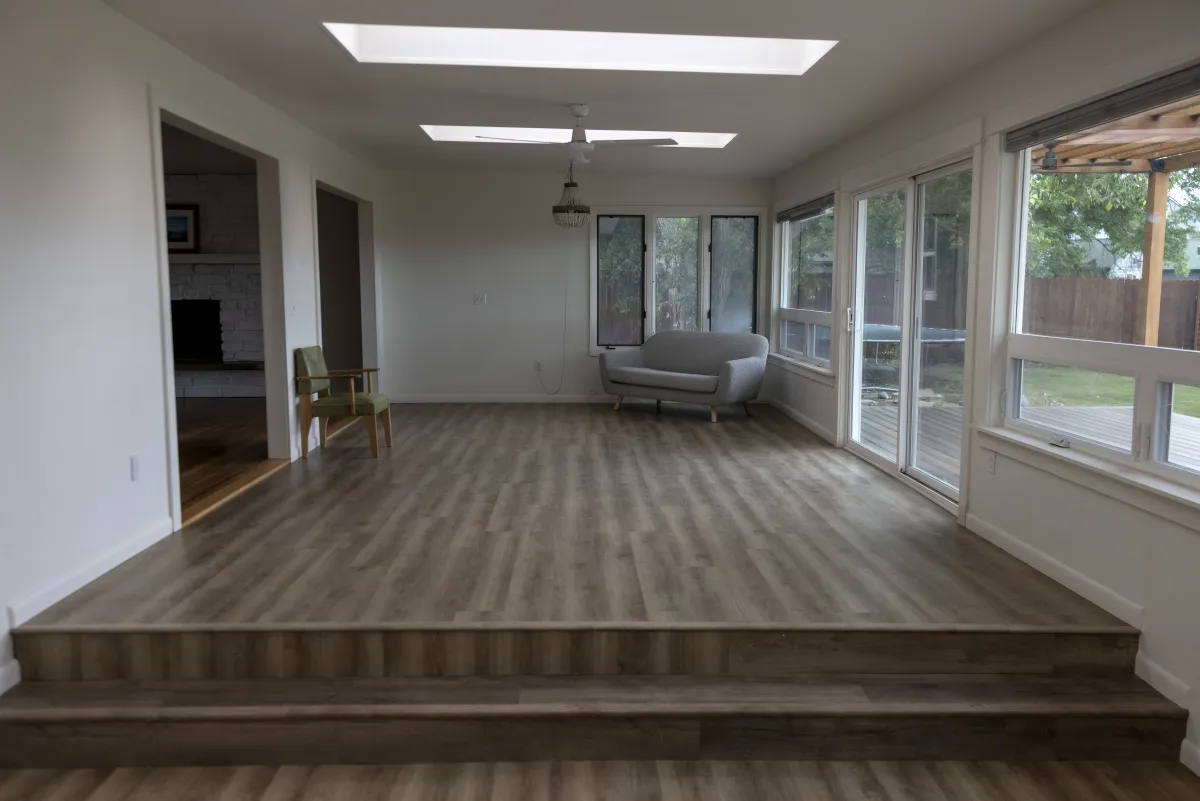 Sunroom addition with skylights by Pilot Peak Construction